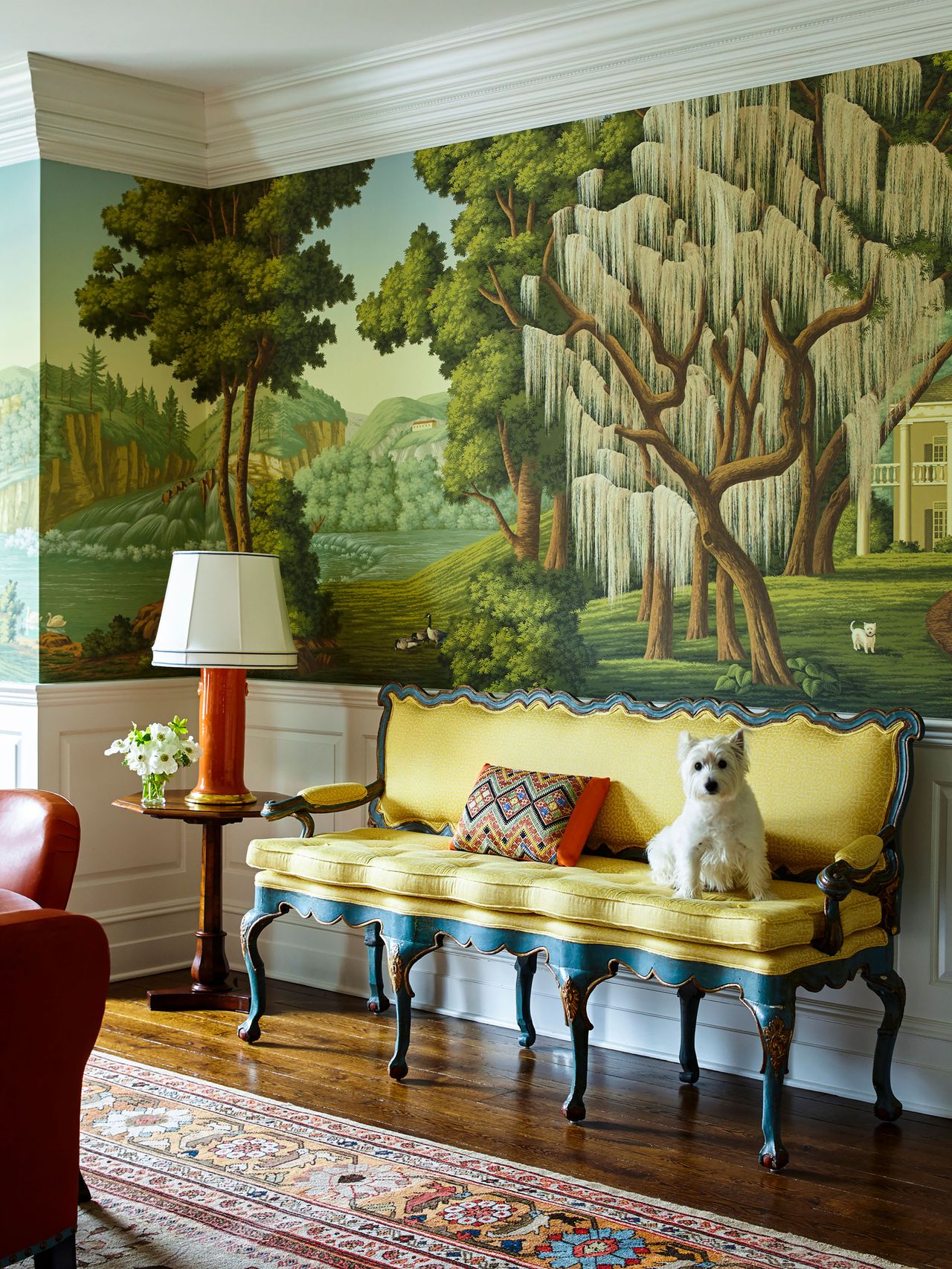 Green landscape tapestry, green sofa