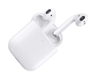 the apple airpods and their charging case