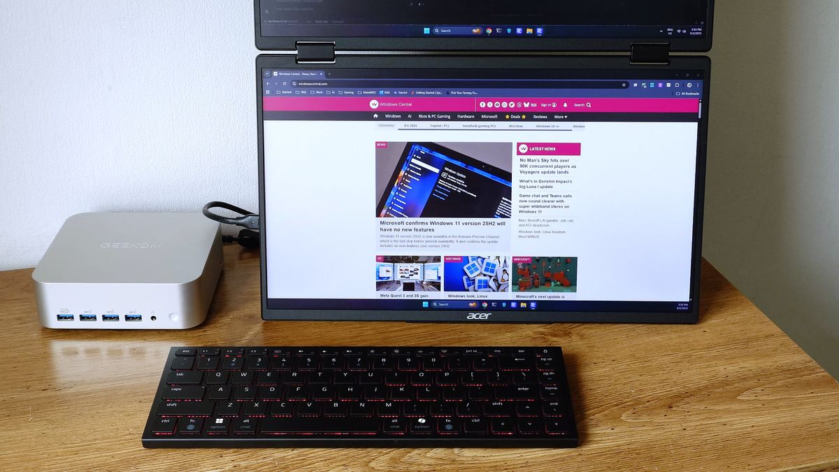 Acer's dual-screen portable monitor connected to a Geekom A9 Max showing the Windows Central homepage.