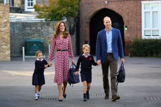 TOPSHOT - Britain's Princess Charlotte of Cambridge, accompanied by her father, Britain's Prince William, Duke of Cambridge, her mother, Britain's Catherine, Duchess of Cambridge and brother, Britain's Prince George of Cambridge, arrives for her first day of school at Thomas's Battersea in London on September 5, 2019. (Photo by Aaron Chown / POOL / AFP) (Photo by AARON CHOWN/POOL/AFP via Getty Images)