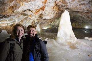Image shows Anna and Stefan wearing 3 in 1 jackets in the Dobsinska Ice Cave in Slovakia