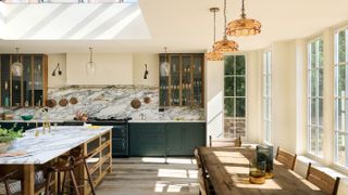 open plan kitchen diner with marble splashbacks