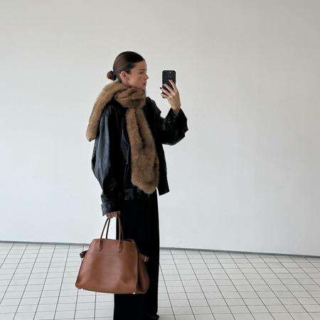 Fashion person rikke krefting wears a faux fur trend 2025.