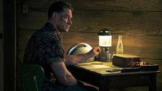 John Cena as a pensive Peacemaker in Peacemaker season 2.