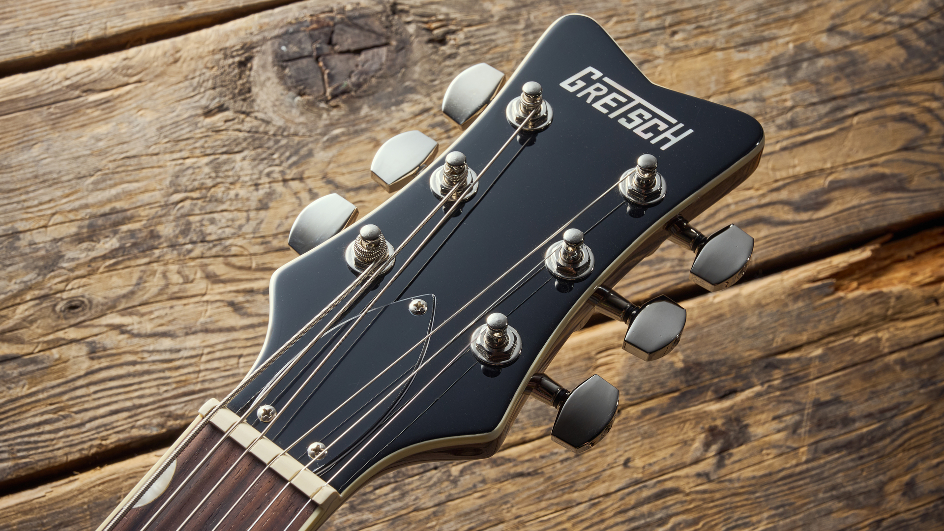 Close up of the headstock on the Gretsch Electromatic Jet Baritone guitar