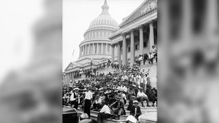 The image is of a group of men, presumably part of the "Bonus Army," on the U.S. Capitol steps. This group consisted of nearly 43,000 marchers - many World War I veterans and their families - who gathered in Washington, D.C., to demand redemptions by cash payments for their service certificates.