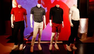 Four mannequins lined up with Sun Day Red clothing on it