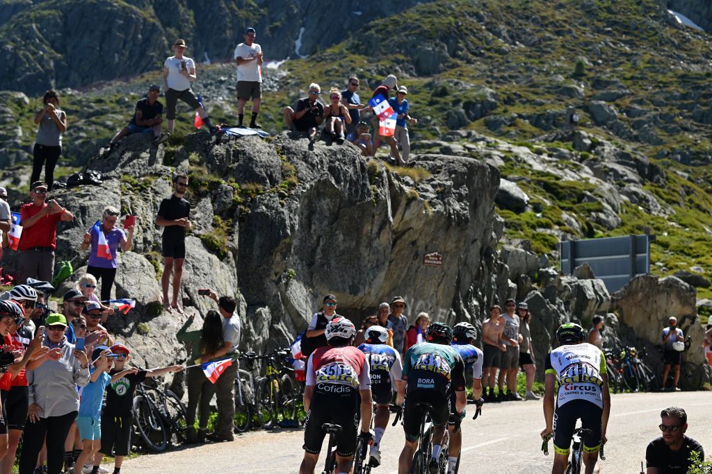 VAUJANY FRANCE JUNE 11 Simon Geschke of Germany and Team Cofidis Mattia Cattaneo of Italy and Team QuickStep Alpha Vinyl Wilco Kelderman of Netherlands and Team Bora Hansgrohe Jan Hirt of Czech Republic and Team Intermarch Wanty Gobert Matriaux and Andrea Bagioli of Italy and Team QuickStep Alpha Vinyl compete while fans cheer during the 74th Criterium du Dauphine 2022 Stage 7 a 1348km stage from SaintChaffrey to Vaujany 1230m WorldTour Dauphin on June 11 2022 in Vaujany France Photo by Dario BelingheriGetty Images