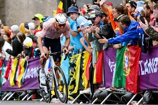 Mathieu van der Poel races to victory during the road race at the UCI Road World Championships in Glasgow