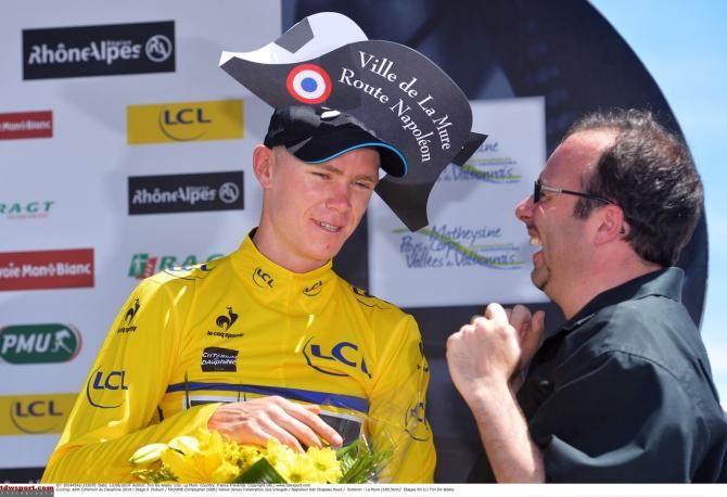 Suits you sir! Froome is given a special Route Napoleon hat at the finish