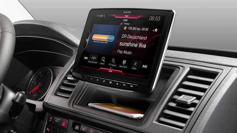 A car interior with a screen installed in the centre console, it's one of the best Android Auto head units