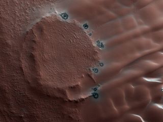Strange "fried egg features" on Mars stand out as stunning winter features on the Red Planet.