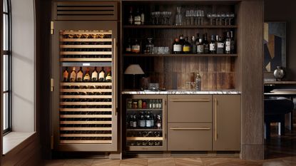 brown kitchen with wine fridge and brown tiles