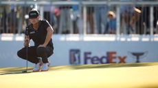 Luke Clanton lines up a putt at the RSM Classic