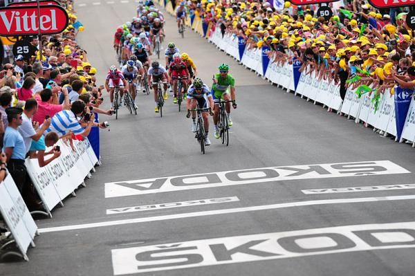 Points leader Peter Sagan (Liquigas-Cannondale) protests the actions of rival Matt Goss (Orica-GreenEdge) in the field sprint for sixth place.