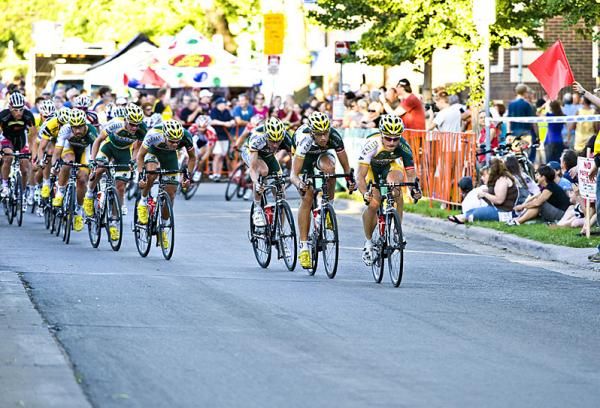 Kelly Benefit Strategies leads the peloton down the backside of the Uptown criterium course.