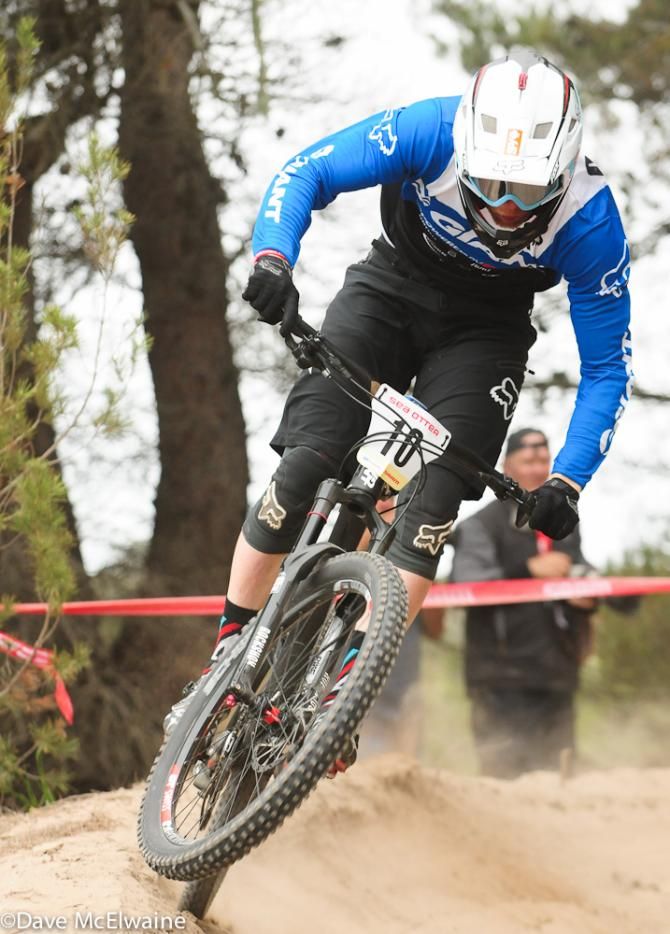 Josh Carlson (Team Giant) coming off the top of a berm