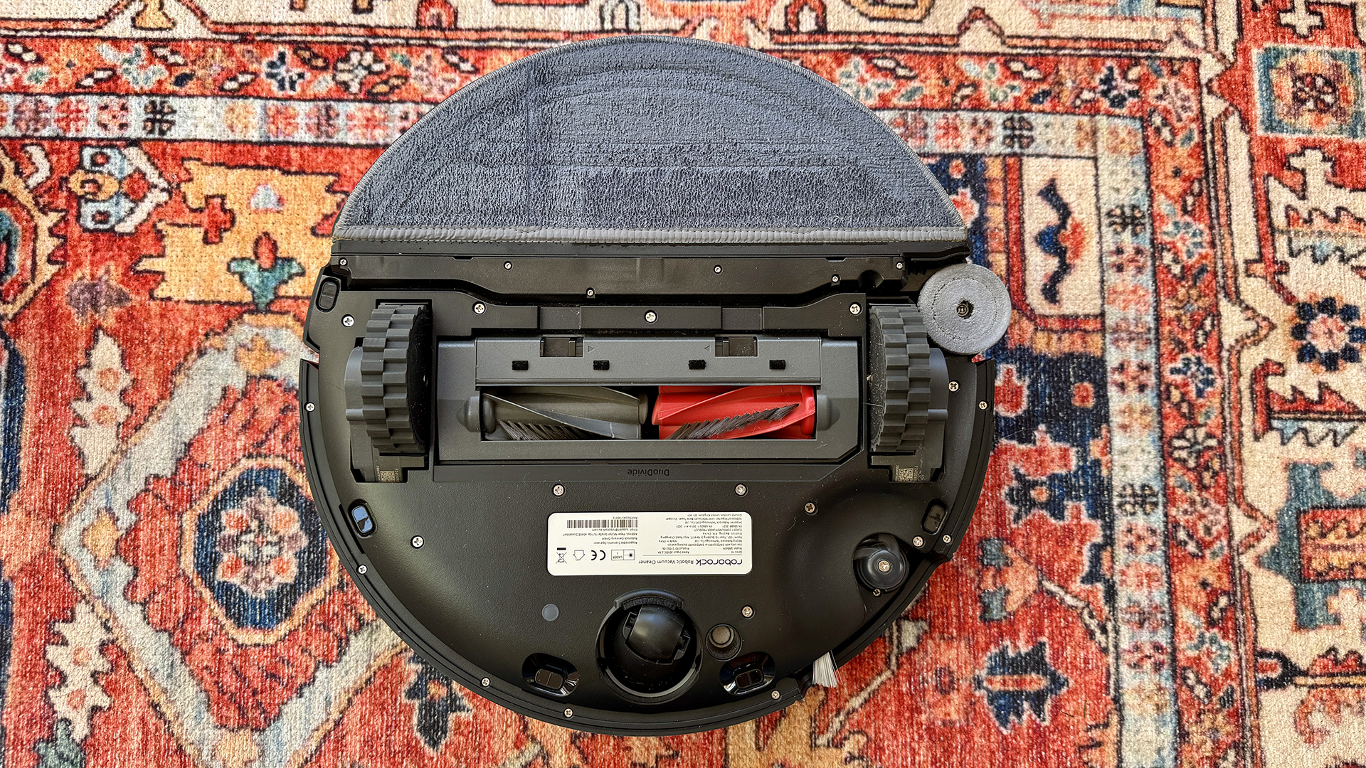 Roborock Saros 10 robot vacuum flipped over to show underside