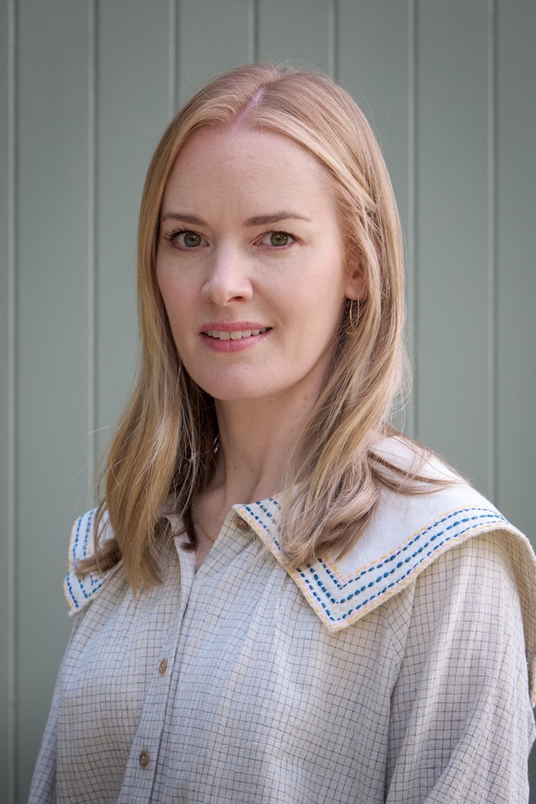 An expert headshot of Holly Vaughan, Co-founder of Vaughan Design & Development