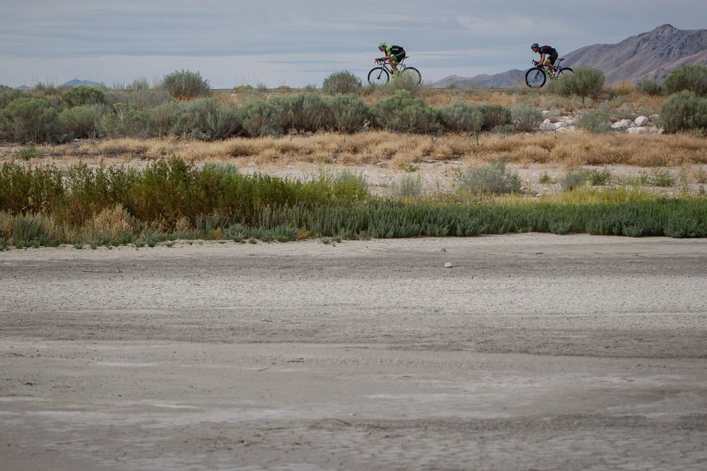 Riders ride across the salt flats after today's start.