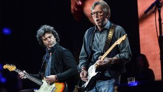 Doyle Bramhall and Eric Clapton perform on stage during the 2013 Crossroads Guitar Festival at Madison Square Garden on April 13, 2013 in New York City. 