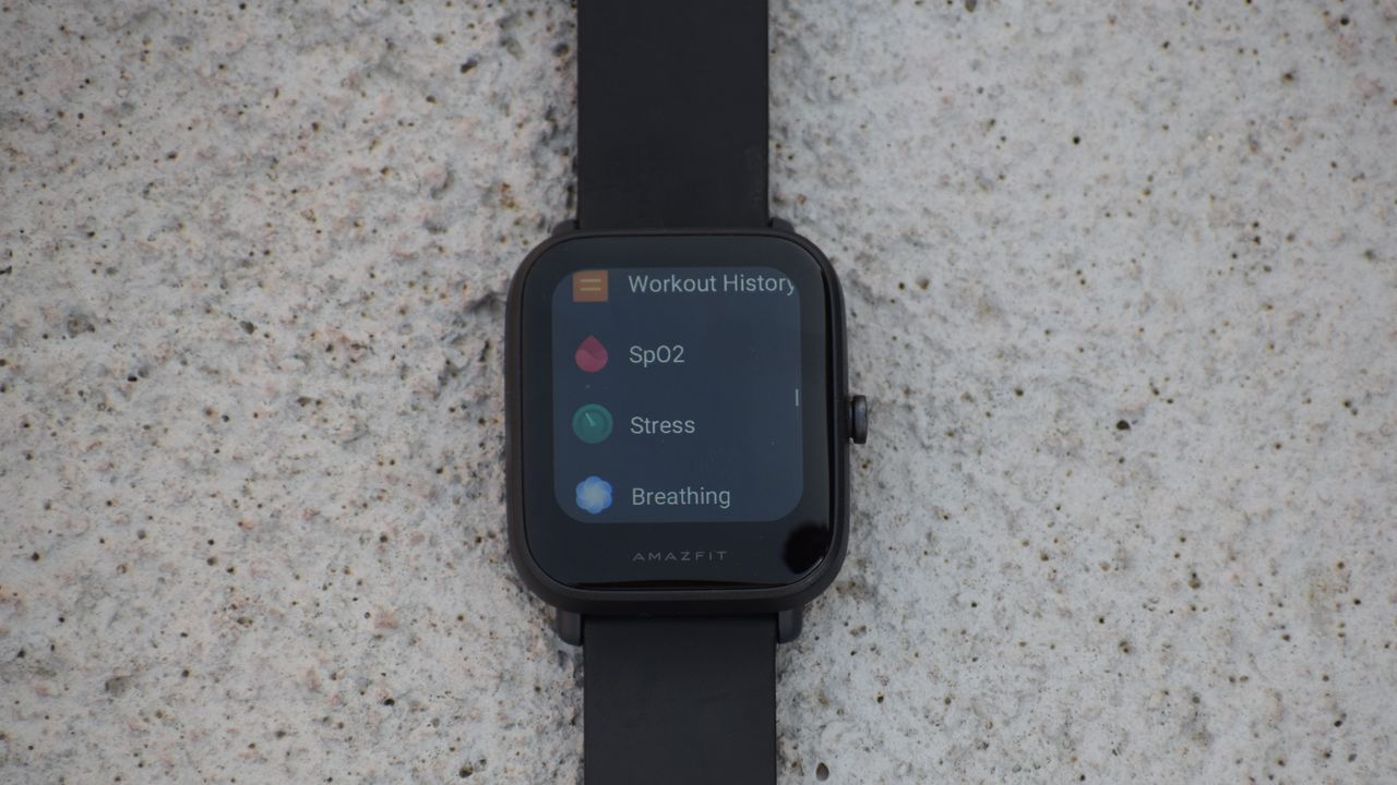 An Amazfit Bip U Pro with the screen on