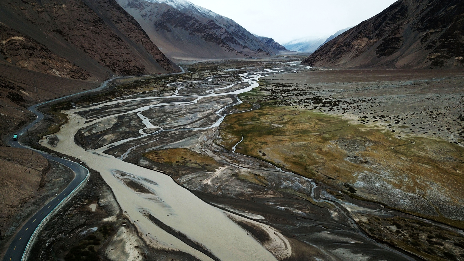 Image of a river flowing through mountains