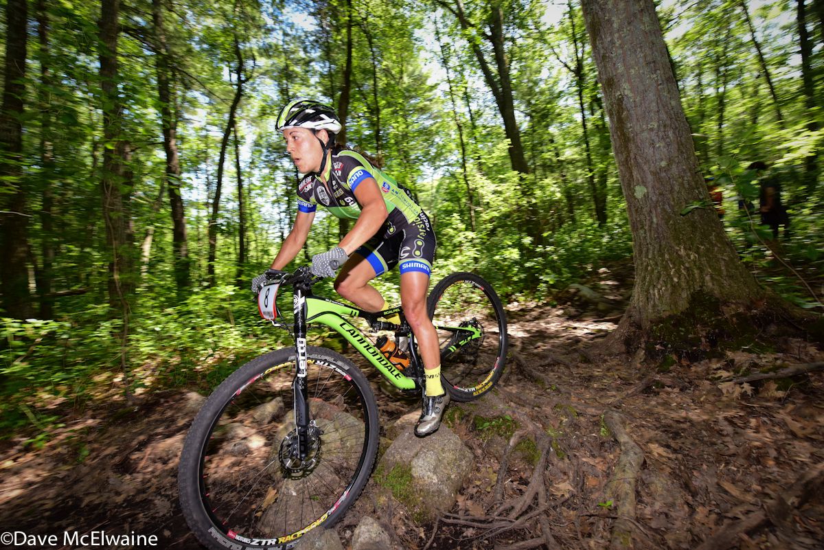 Crystal Anthony (Riverside Racing) leading through the roots and rocks on lap one