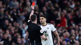 Aleksandar Mitrovic is shown a red card by Chris Kavanagh