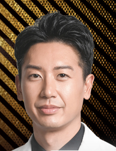 an asian man in a white lab coat