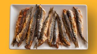 plate of cooked anchovies