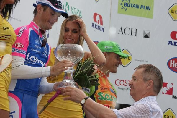 The rain falls on the podium ceremony.