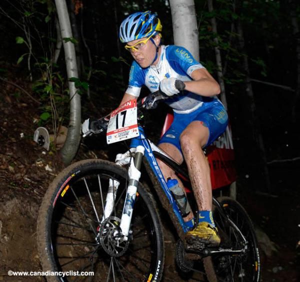 Georgia Gould rides alone on the single track.