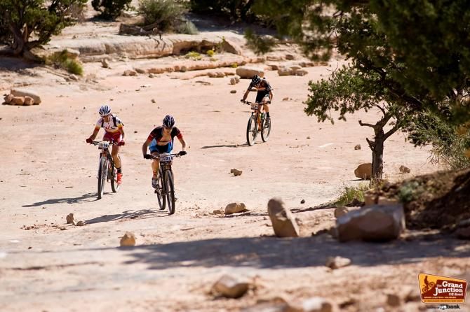 The top riders on a climb