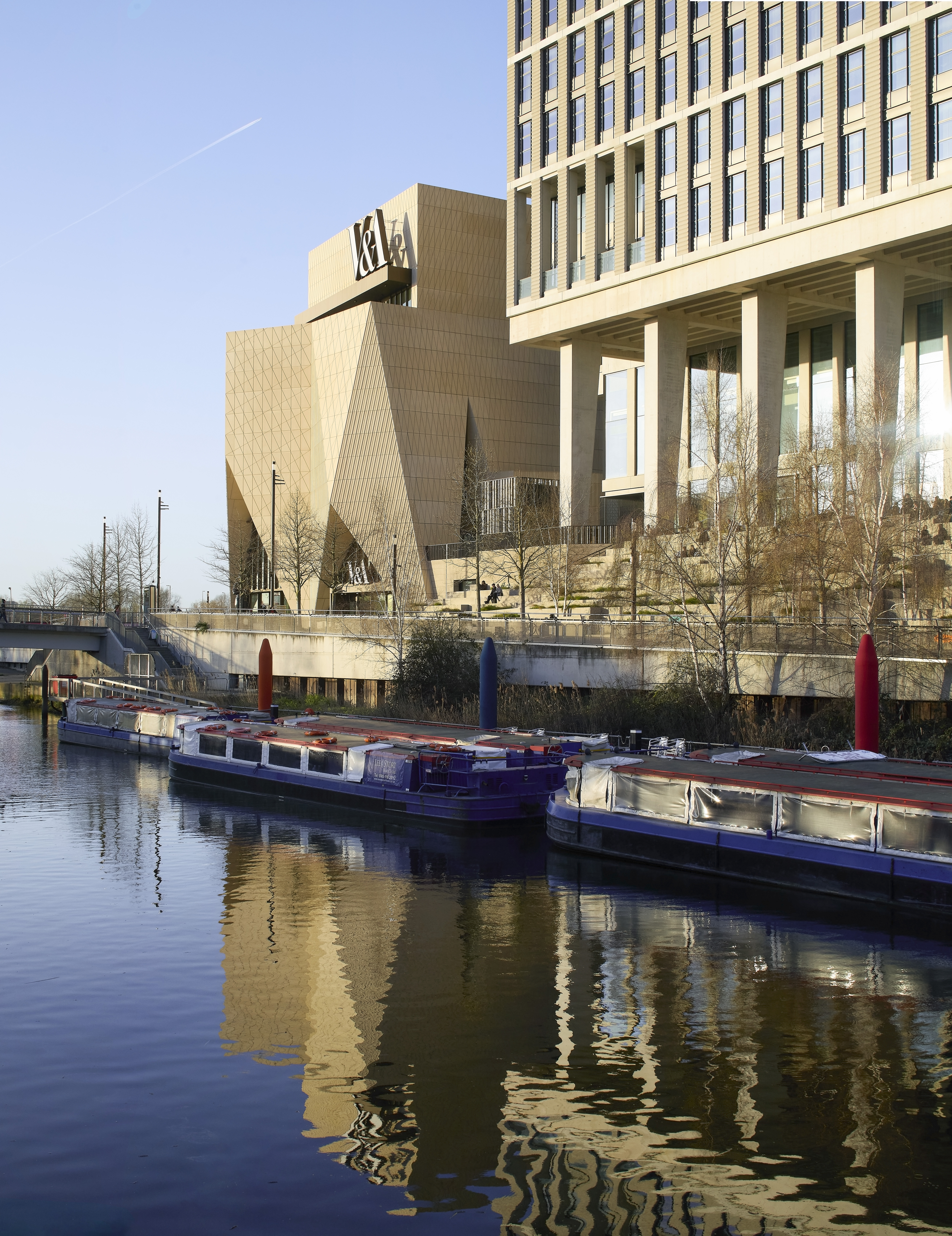 exterior views of V&amp;amp;A East Museum, with its faceted patterned facade