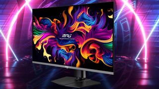 MSI MPG 322URX QD-OLED monitor with neon background behind