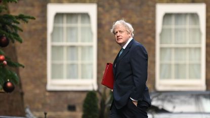Boris Johnson walks into No. 10 Downing Street