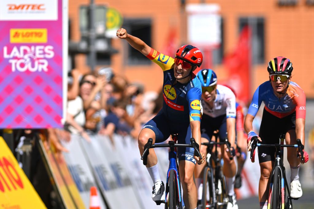 MUHLHAUSEN GERMANY JUNE 28 LR Lucinda Brand of The Netherlands and Team LidlTrek celebrates at finish line as stage winner ahead of Mischa Bredewold of The Netherlands and Team SD WorxProtime and Karlijn Swinkels of The Netherlands and UAE Team Adq during the 36th Internationale LOTTO Thringen Ladies Tour 2024 Stage 4 a 1114km stage from Muhlhausen to Muhlhausen on June 28 2024 in Muhlhausen Germany Photo by Luc ClaessenGetty Images