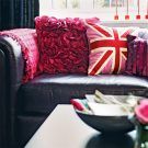 living room with pink cushion sofa