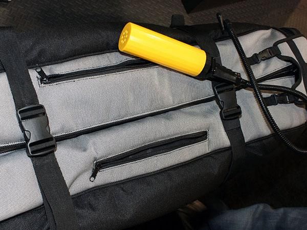 Extra pockets up top hold smaller items like pedals, skewers and the included pump.