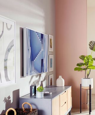 Pastel coloured living room with Samsung Frame TV on the wall
