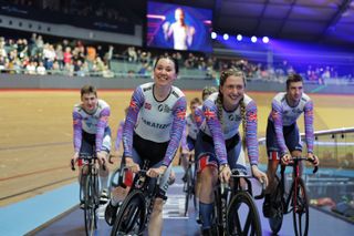 Katie Archibald and Laura Kenny lead a lap of honour for the British riders in London at the Track Champions League