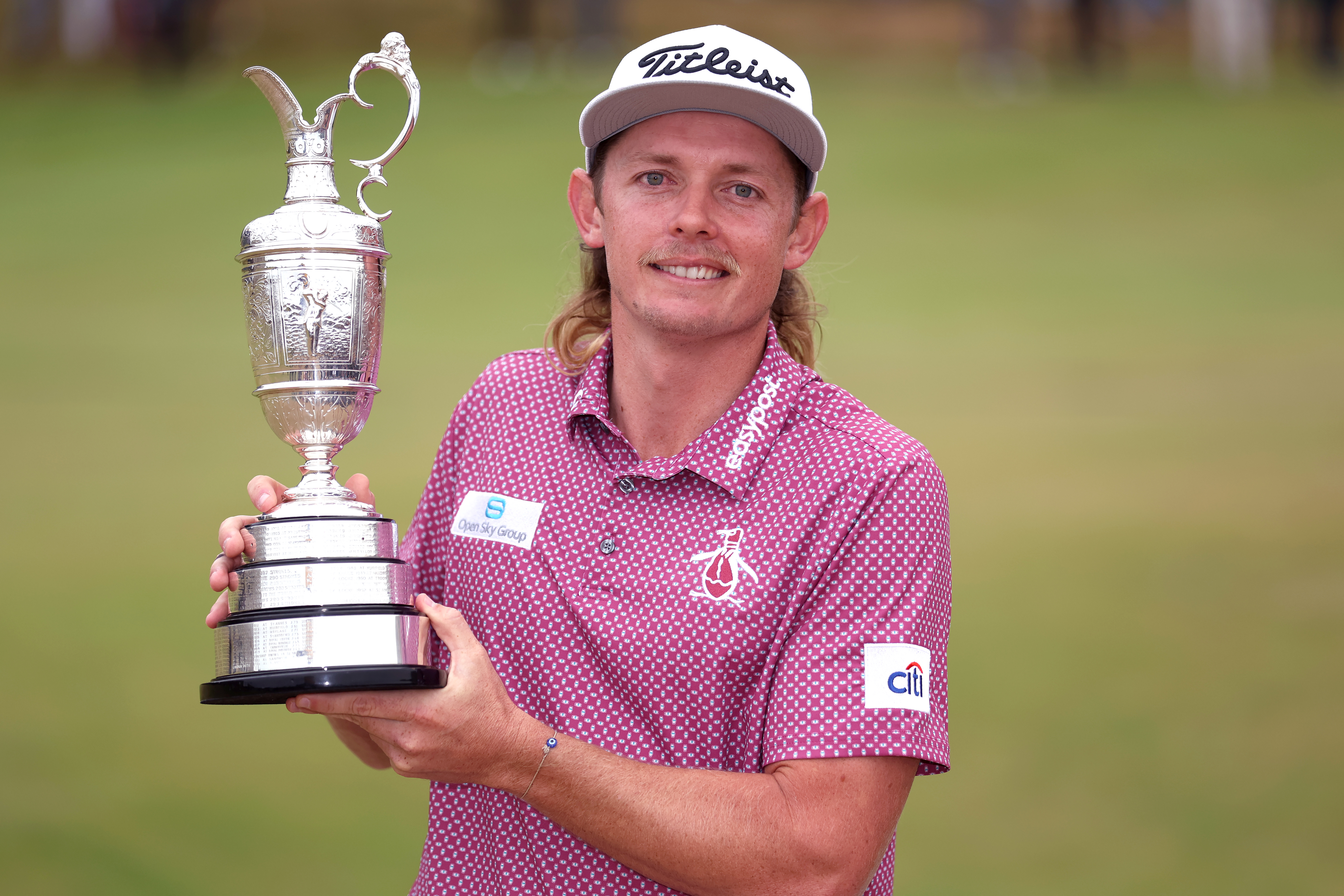 Cameron Smith poses with the Claret Jug after winning The 150th Open at St Andrews Old Course.