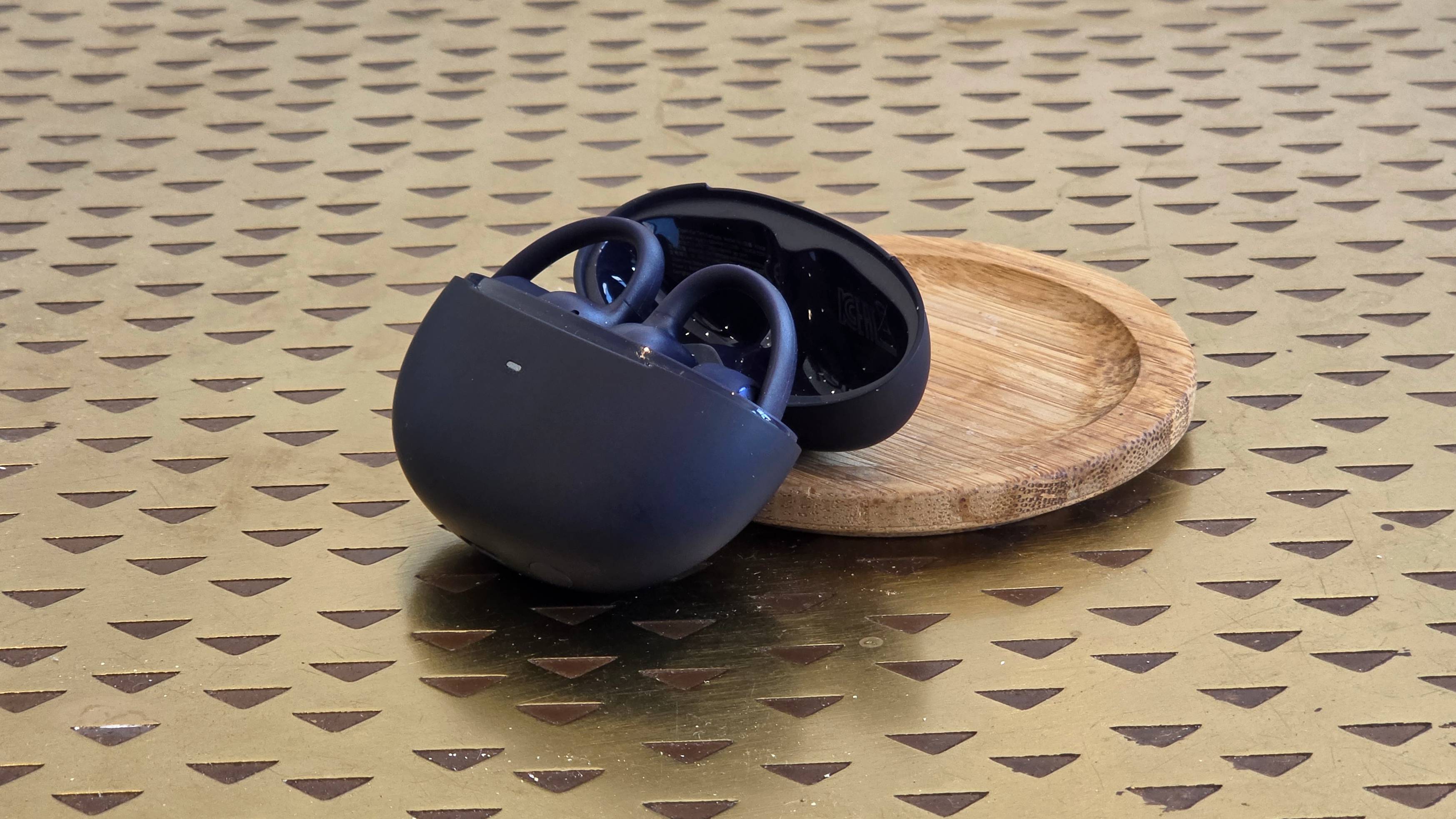 The Baseus Bowie MC2 on a bronze table.