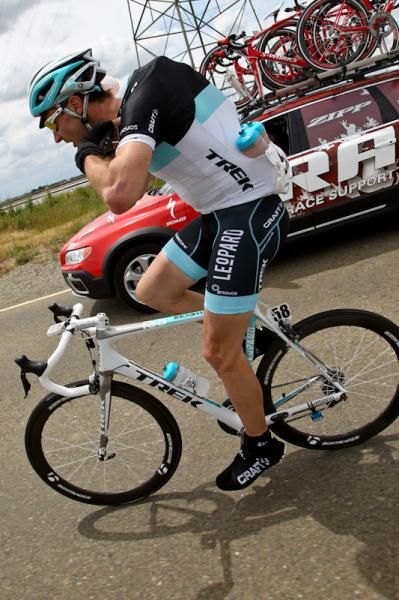 Jens Voigt (Leopard Trek) bringing up bottles for the team