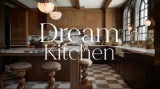 A kitchen with white oak cabinets and island with marble countertops and a checkerboard floor