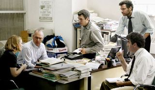 Spotlight the cast discusses the story at Michael Keaton's desk