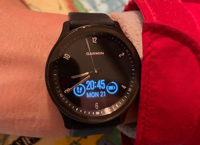 Male cyclist wearing the Garmin Vivomove Sport which is one of the best smartwatches for cycling