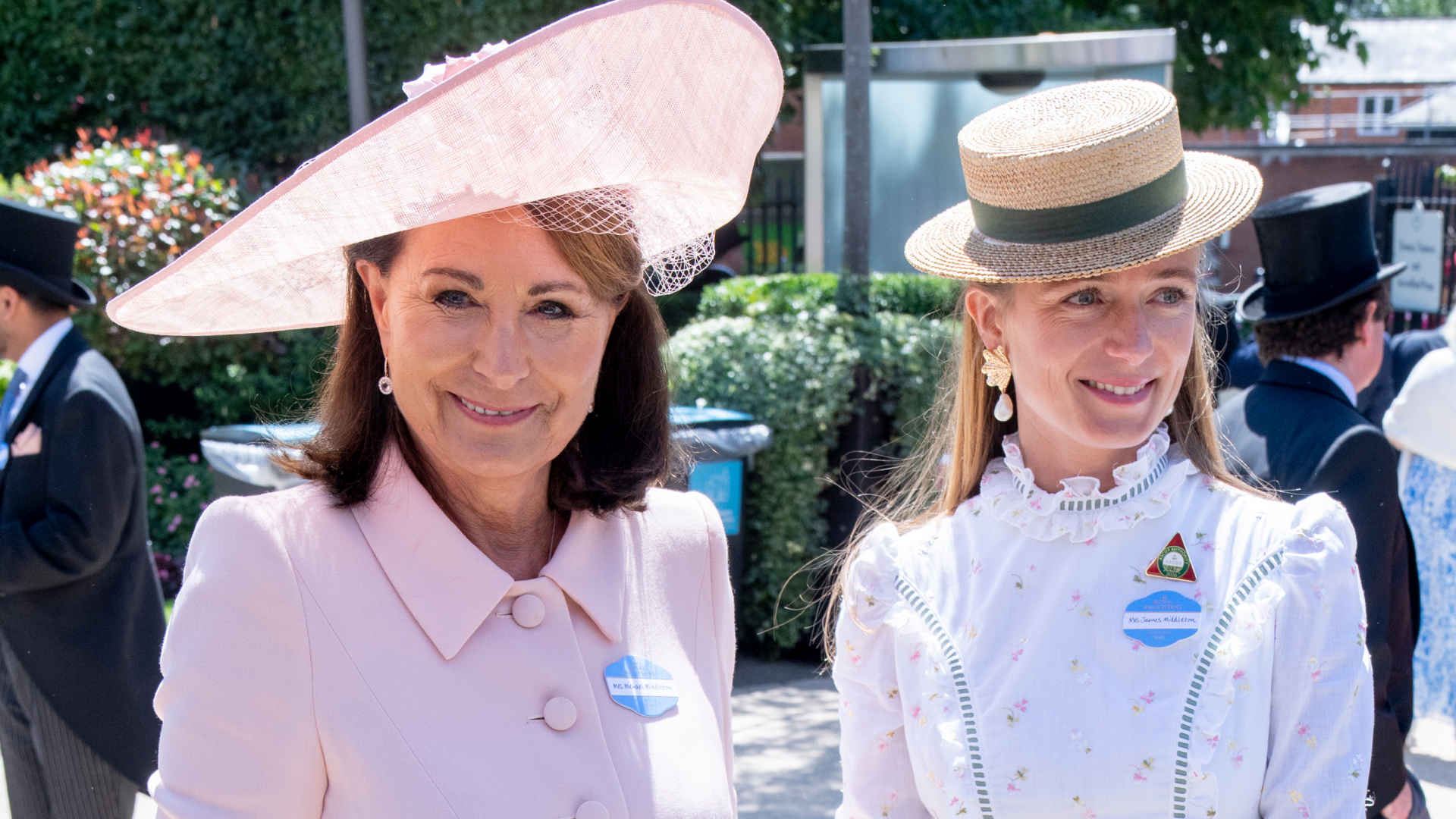 Carole Middleton wears a baby pink dress and matching hat, while carrying a top handle bag in the same shade to attend Royal Ascot 2026