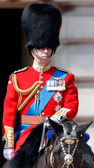 Prince Andrew, Duke of York (wearing the uniform of Colonel of the Grenadier Guards) rides on horseback as he takes part in Trooping The Colour in 2018
